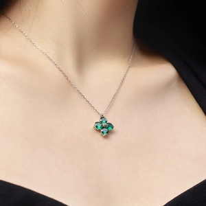 S925 sterling silver necklace with a green clover pendant featuring prong-set zircons