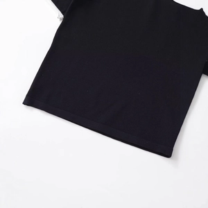 Women's black short sleeve t-shirt with ribbed hem details and soft knit texture