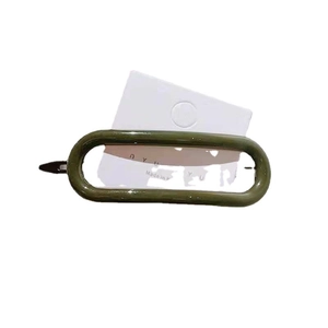 Olive green oval hair clip with cutout design on white background for women