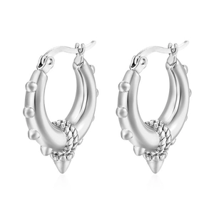 Silver stainless steel hoop earrings with spiked cone charms and beaded texture details