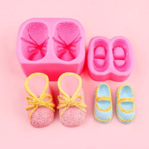 Pink silicone baby shoe molds for handmade soap, resin crafts, and fondant decorations