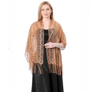 Detail of caramel lace shawl featuring delicate floral patterns and long fringe trim