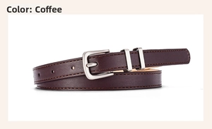 Detail of coffee brown leather belt featuring litchi grain and silver buckle