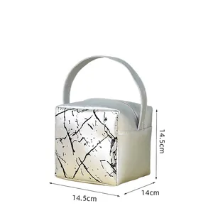 Detailed view of silver metallic makeup bag showing dimensions and 130g lightweight design