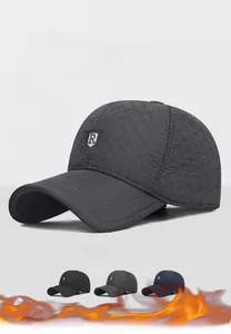 Close-up of quilted winter baseball cap showing three color options and thermal design