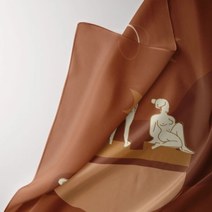 Close-up of bohemian terracotta tapestry showing elegant white minimalist female line art