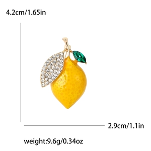 Lemon enamel brooch with green crystal leaf and rhinestones on gold-toned metal base