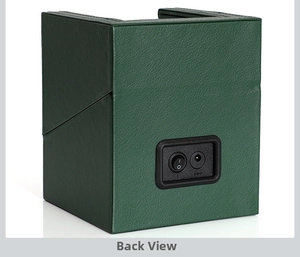 Detail view of the power switch and DC interface on the dark green leather watch winder box