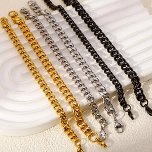 Flat Cuban chain bracelets in gold, silver, and black finishes with lobster clasps