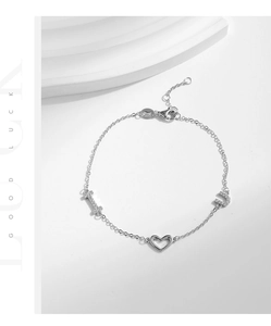 Detailed view of S925 silver bracelet featuring I Love You hollow heart pendants