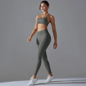 Olive green seamless yoga set featuring cross-back sports bra and high-waisted leggings