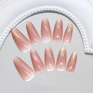 Pink cat-eye gradient press-on nails with white French tips and almond shape set