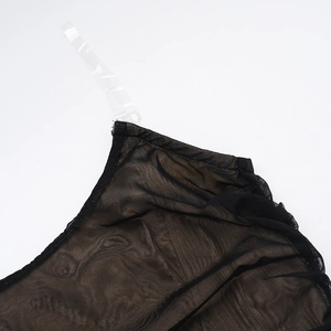 Close-up of black mesh dress featuring clear adjustable straps and fine fabric texture