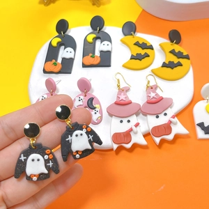 Handmade Halloween polymer clay earrings featuring ghost pumpkin and bat shapes