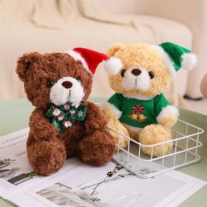 Festive Christmas plush teddy bears with holiday hats on a cozy living room green table