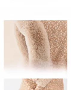 Close-up of thick plush faux fur texture with white spotted pattern on brown winter hat