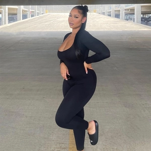 Detailed full-body view of a black high-elastic long-sleeve jumpsuit with a U-neck design