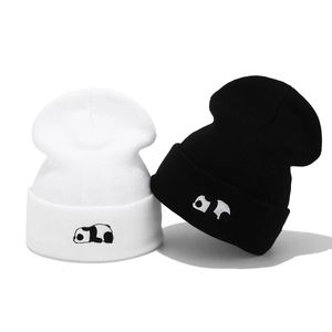 Set of two cute embroidered panda knit beanies in black and white for winter warmth