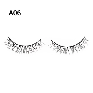 Detailed macro shot of natural A06 style false eyelashes with fine black fibers