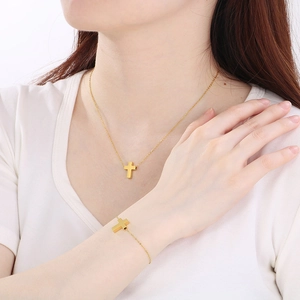 Fashionable gold stainless steel cross pendant necklace and bracelet jewelry set for women