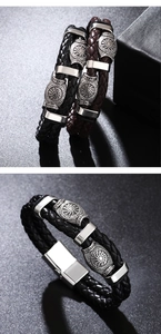 Détail de bracelets en cuir tressé avec runes vikings et fermoirs magnétiques