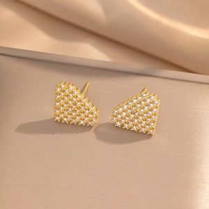 Minimalist pixel heart stud earrings with shiny cubic zirconia in gold plating