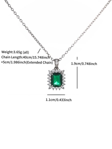 Detail of silver necklace with green square gemstone pendant and size dimensions
