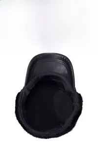 Close-up of windproof faux leather flat cap with warm black fleece lining and ear flaps