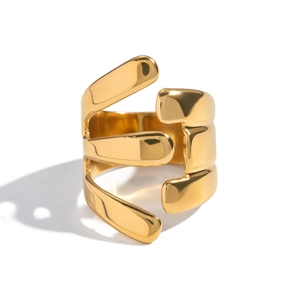 Minimalist wide gold ring with irregular geometric layers and polished finish