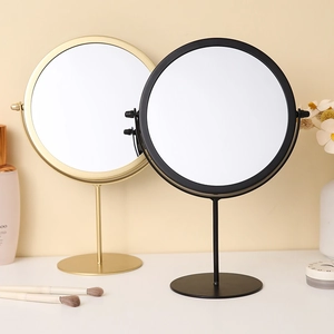 Nordic iron round desk makeup mirrors in gold and black finishes with swivel base