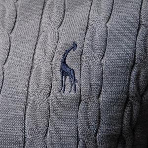 Grey cable-knit sweater for men featuring a blue giraffe embroidery detail