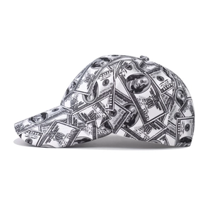 Baseball cap with black US dollar bill print on white fabric from a side profile view