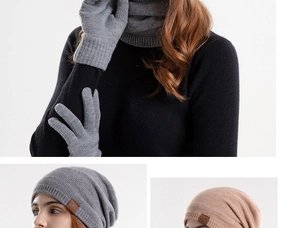 Close-up of ribbed knit texture on thermal winter beanie, scarf, and gloves set