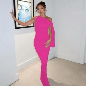 Detail of elegant one-shoulder fuchsia maxi dress with slim fit and modern minimalist style