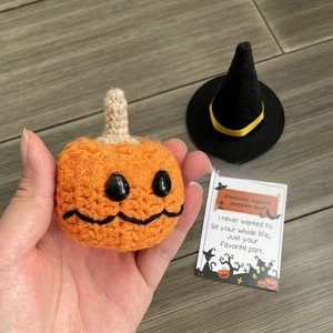 Handmade crochet pumpkin doll with a black wizard hat and emotional greeting card