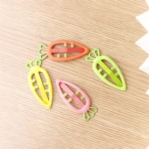 Set of four candy-colored carrot hair clips in orange, yellow, pink, and green colors