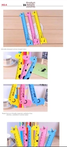 Detail of 15cm cartoon giraffe and elephant plastic rulers with clear scales for students