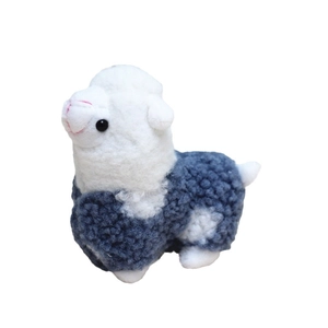 Cute mini alpaca plush toy with white face and grey curly wool texture on white background