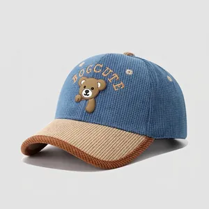 Kids corduroy baseball cap with cartoon bear patch and blue-brown patchwork design