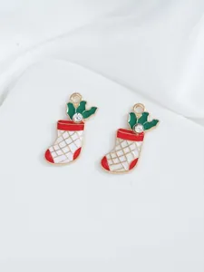 Detail view of Christmas stocking charms with red enamel and small rhinestone accents