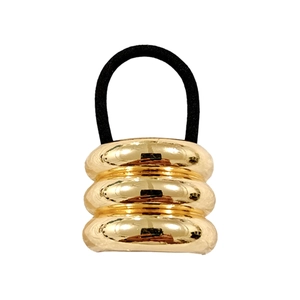 Minimalist punk style gold metal hair tie with triple-layered vertical rings design