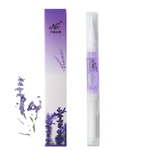 Macro shot of revitalizing peach cuticle oil pen with branded packaging and lavender decor