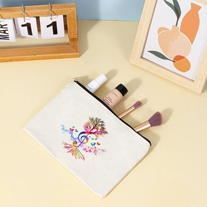 Detailed scene of canvas makeup bag with colorful musical tree print and cosmetics