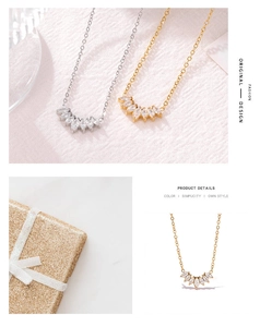 Detail view of gold and silver necklaces with marquise-cut zircon petal pendants
