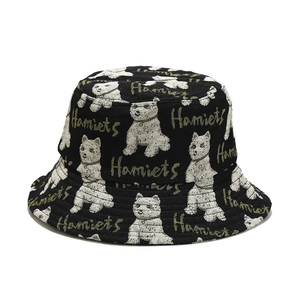 Fashionable black bucket hat with white cartoon dog and letter jacquard pattern