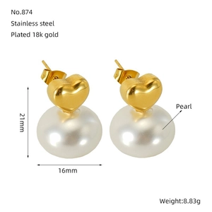 Close-up of 18k gold plated heart-shaped earrings with large white pearls and size specs