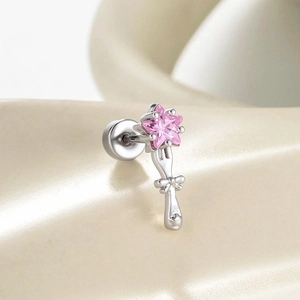 Bow and star cartilage earring with pink zircon, crafted in polished silver metal finish