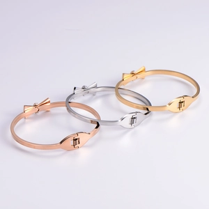 Fashion bow knot crystal bangle in gold, silver and rose gold with spring closure