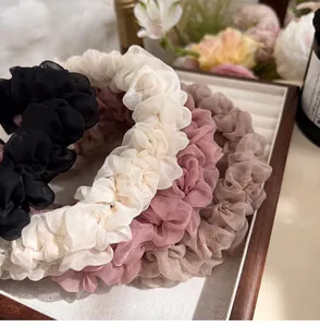Elegant pleated organza headbands for women in soft black white pink and purple colors