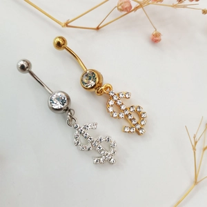 Main view of gold and silver dollar sign navel rings with sparkling white rhinestones